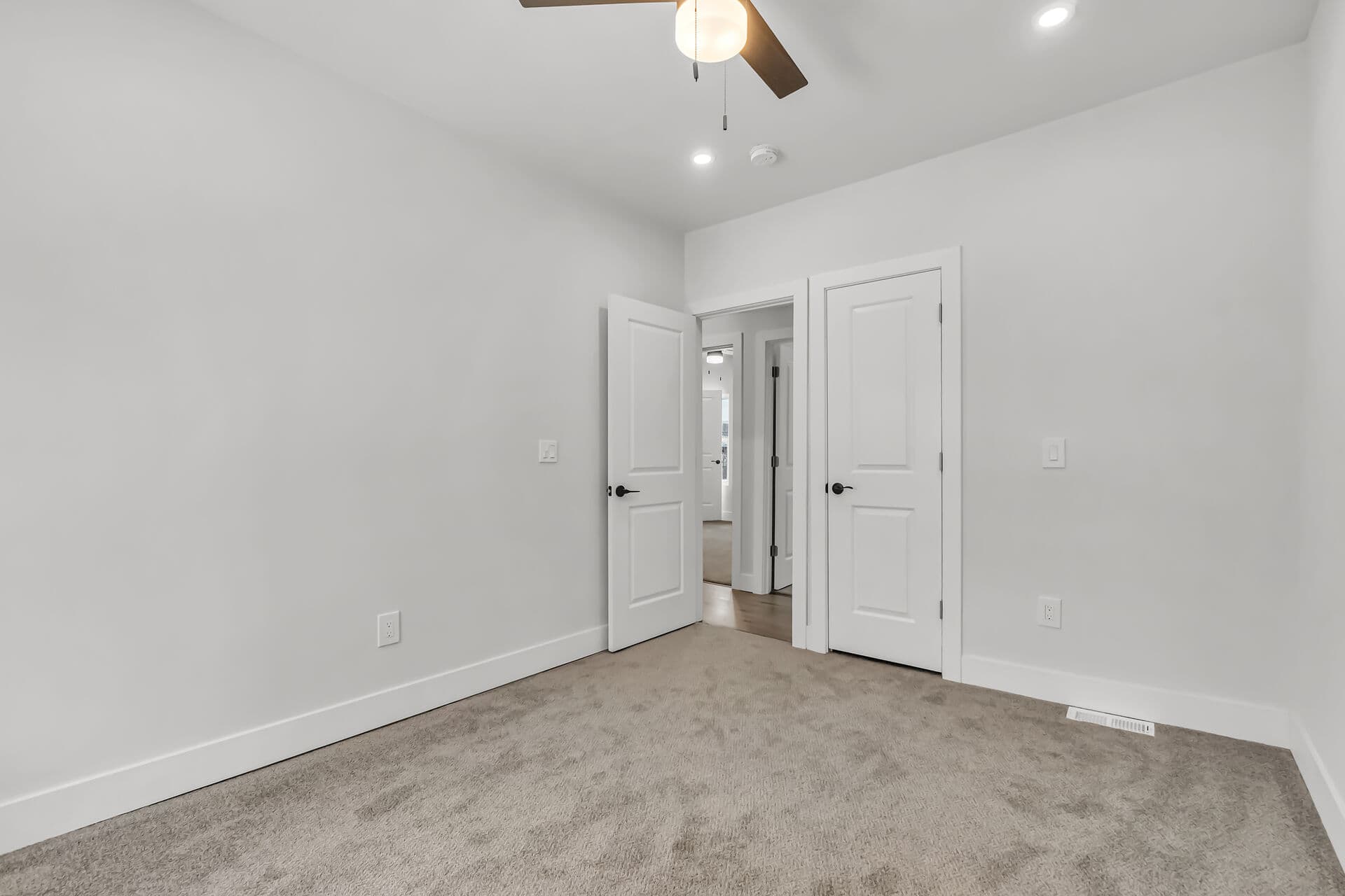 Bedroom 4 - door (left) and closet (right)